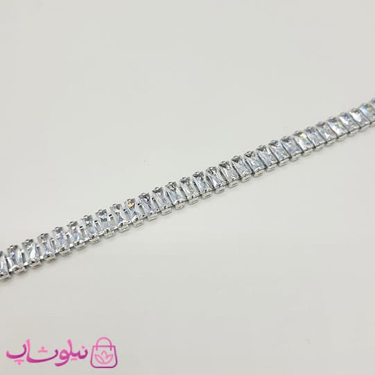 سرویس زنانه تنیسی مدل نقره ای با نگینهای سفید باگتی کد 640 — تصویر ۲