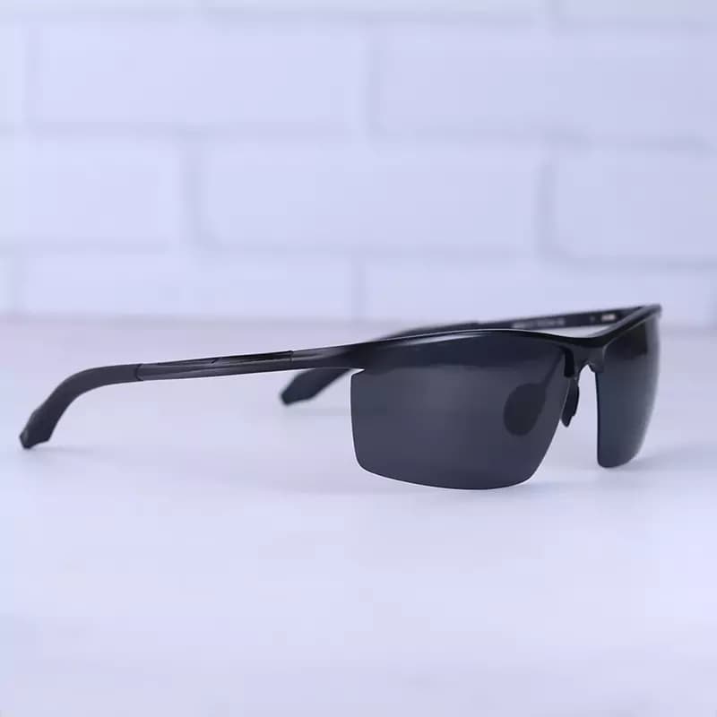 عینک آفتابی مردانه پلیس مشکی نیم فریم 8556/1 — تصویر ۴