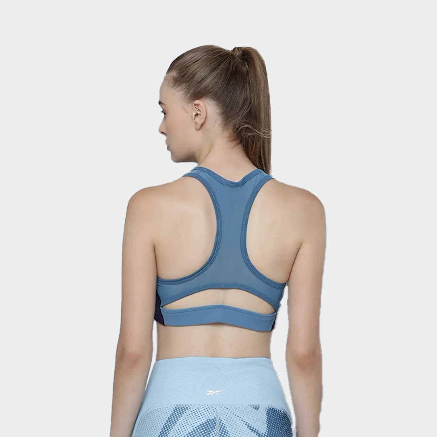 نیم تنه زنانه ریباک مدل Lux Racer Padded Padded Bra Blue White — تصویر ۲