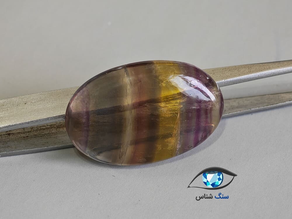 سنگ فلوریت رنگین کمانی بیضی 11.8 گرم — تصویر ۳