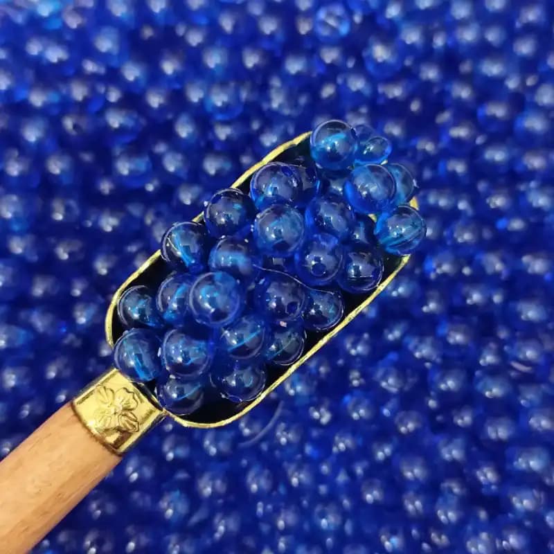 مهره رنگی ایرانی شفاف آبی کاربنی سایز 8میل(100گرمی)