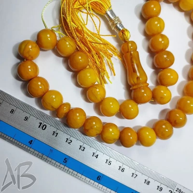 تسبیح سندلوس 33 دانه بودار تراش شلغمی زرد کهربایی و خوش تراش کد 829 آقابزرگ — تصویر ۲
