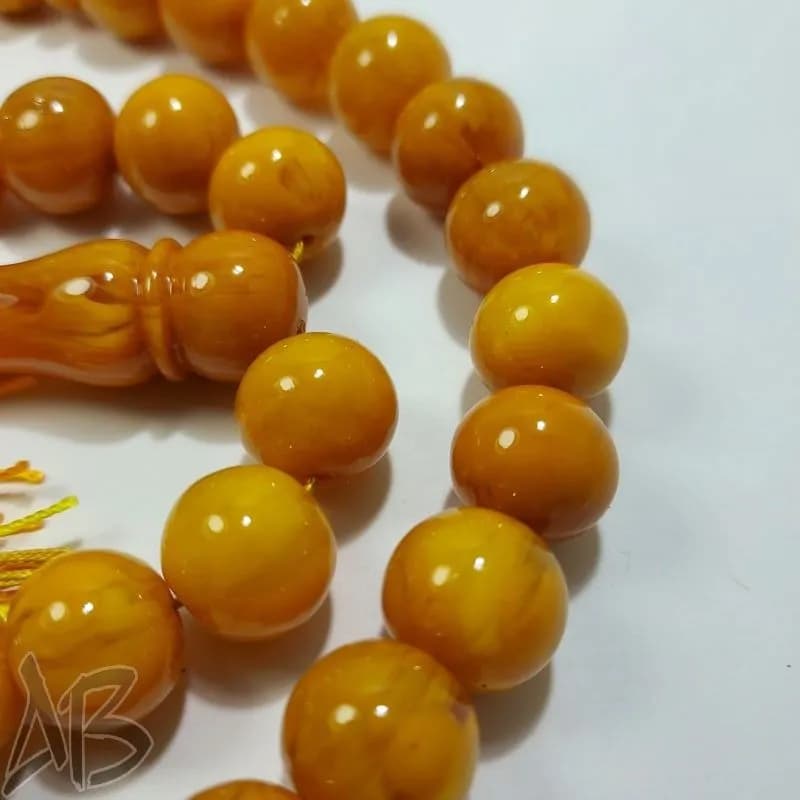 تسبیح سندلوس 33 دانه بودار تراش شلغمی زرد کهربایی و خوش تراش کد 829 آقابزرگ — تصویر ۵