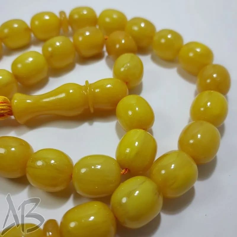 تسبیح سندلوس 33 دانه بودار تراش استوانه ای زرد کهربایی خوش تراش کد 827 آقابزرگ — تصویر ۴