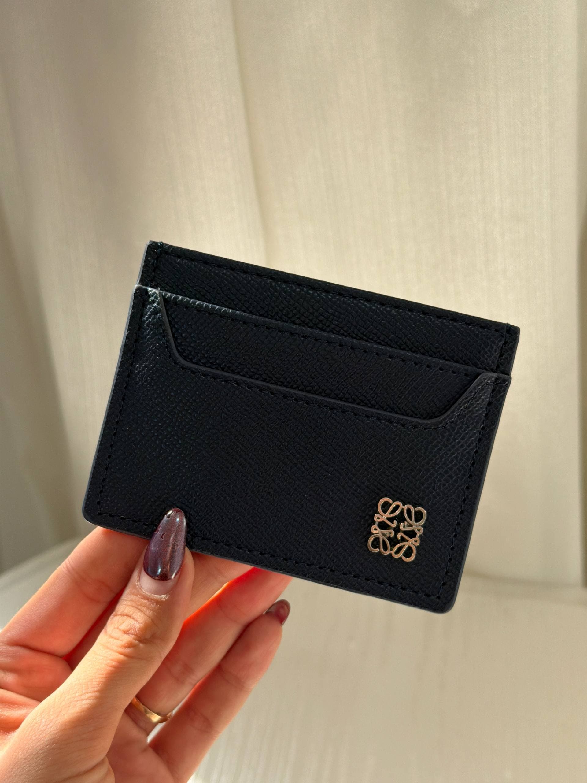 جا کارتی لوه Loewe — تصویر ۳