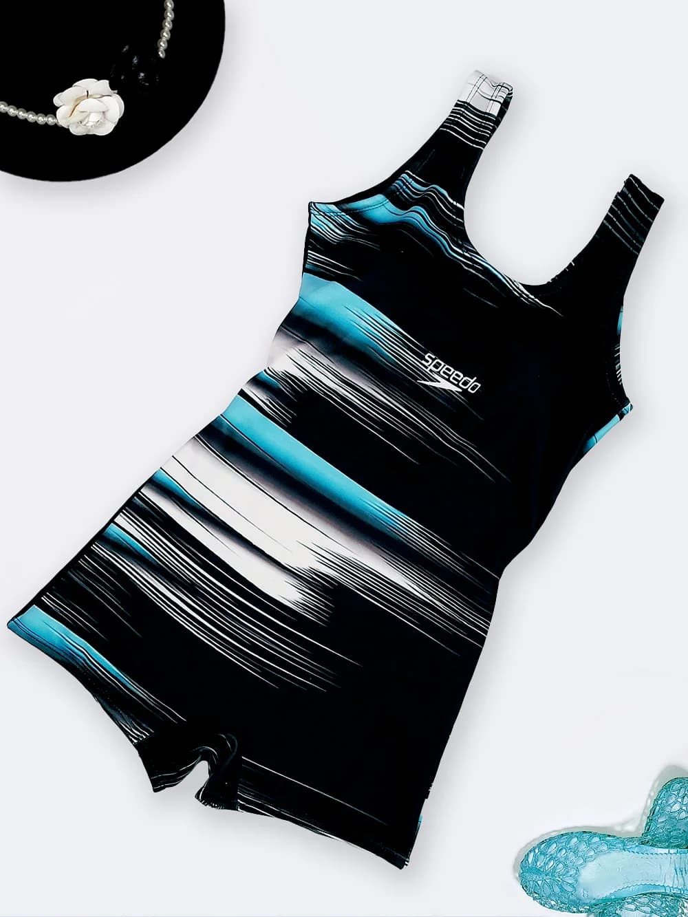 مایو نیمه پوشیده زنانه پادار و کاپدار برای استخر اسپیدو ( Speedo ) با خطوط فیروزه ای