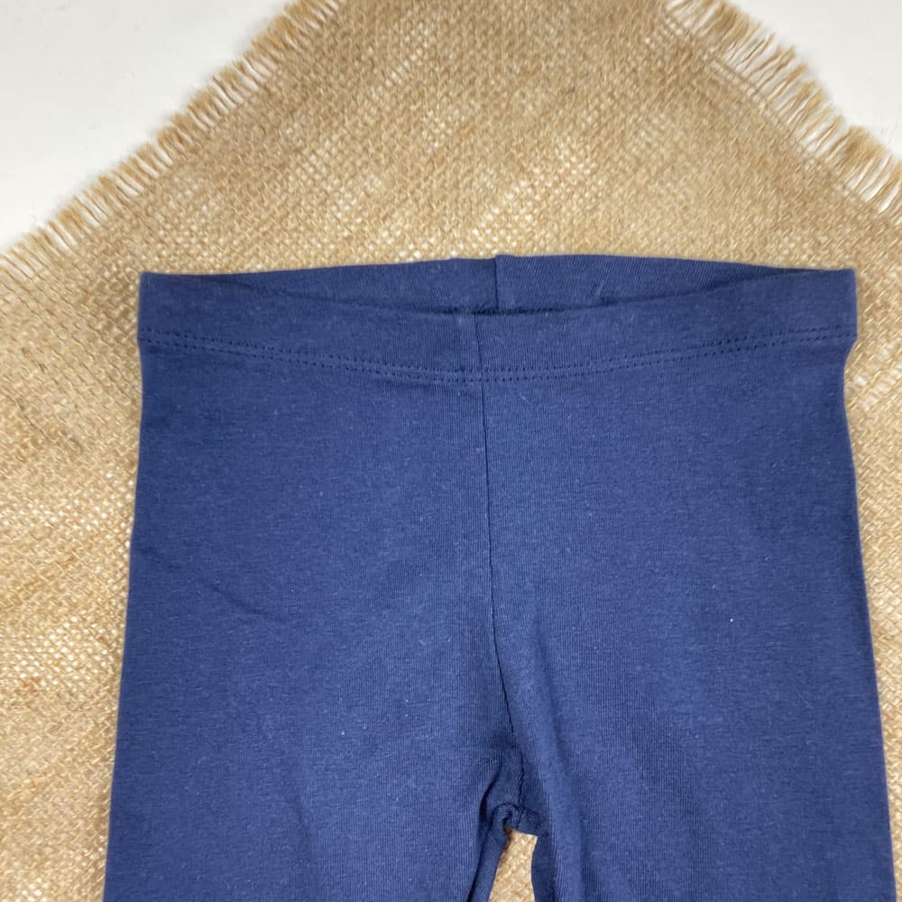 شلوار نوزادی دخترانه جذب طرح ساده کمرکش سرمه ای رنگ – 6 تا 12 ماه — تصویر ۲