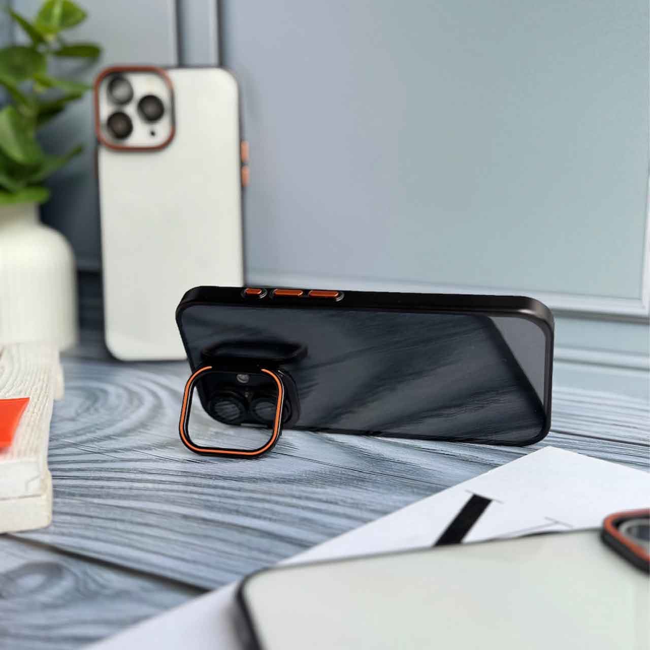 قاب orange lens استند شو با محافظ لنز برای گوشی های آیفون — تصویر ۳