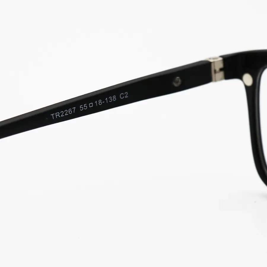 عینک طبی 4 کاوره با فریم مستطیلی شکل، رنگ مشکی مات، از جنس کائوچو و لولا فنردار Ray-Ban مدل TR2267 — تصویر ۸