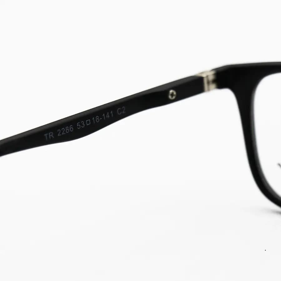 عینک طبی 4 کاوره با فریم مستطیلی باریک، رنگ مشکی مات، از جنس کائوچو و لولا فنردار Ray-Ban مدل TR2286 — تصویر ۸