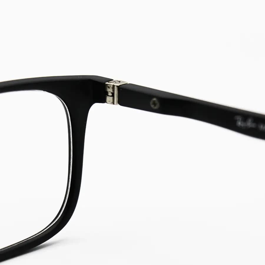 عینک طبی 4 کاوره با فریم مستطیلی باریک، رنگ مشکی مات، از جنس کائوچو و لولا فنردار Ray-Ban مدل TR2286 — تصویر ۶
