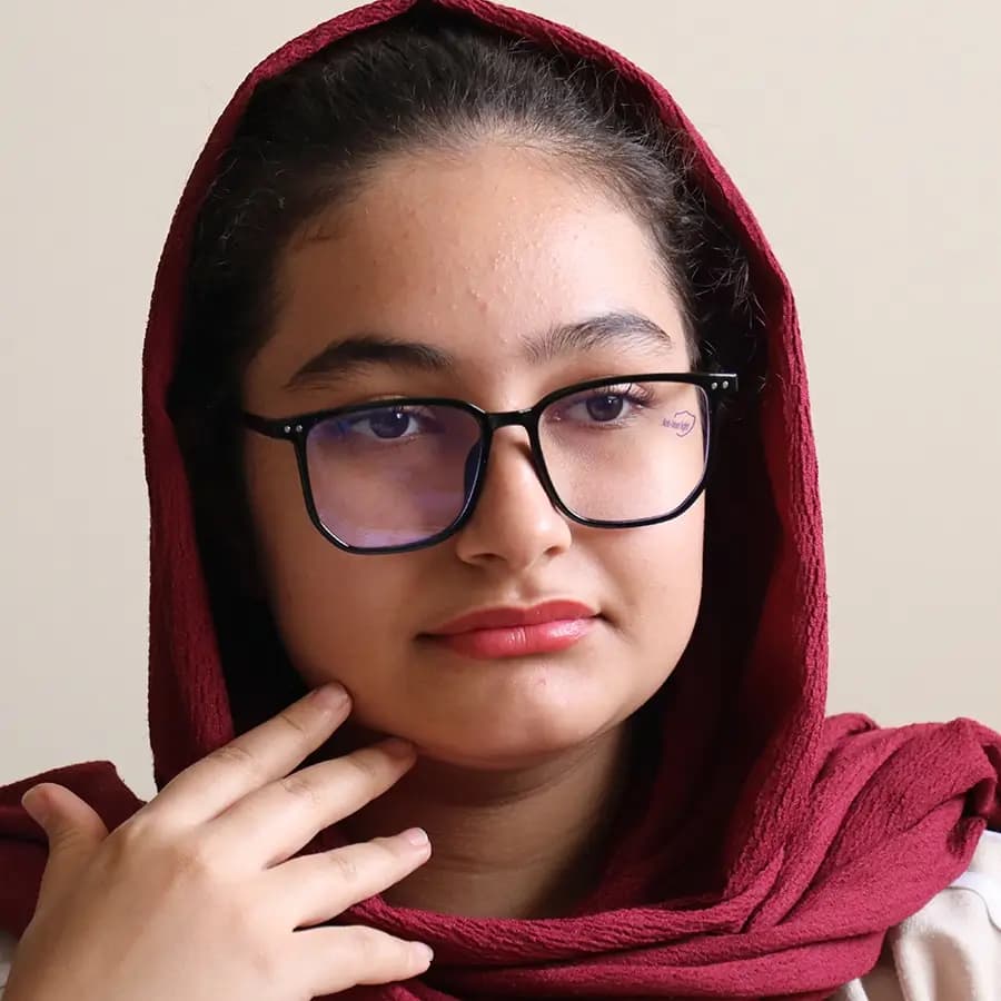عینک با فریم صورتی رنگ، شکل مربعی، از جنس کائوچو و لنز بلوکات مدل 20355 — تصویر ۲