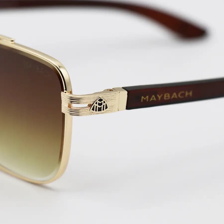 عینک آفتابی لاکچری Maybach با فریم طلایی، مربعی شکل، دسته چوبی و لنز قهوهای گرادینت مدل 23186 — تصویر ۶