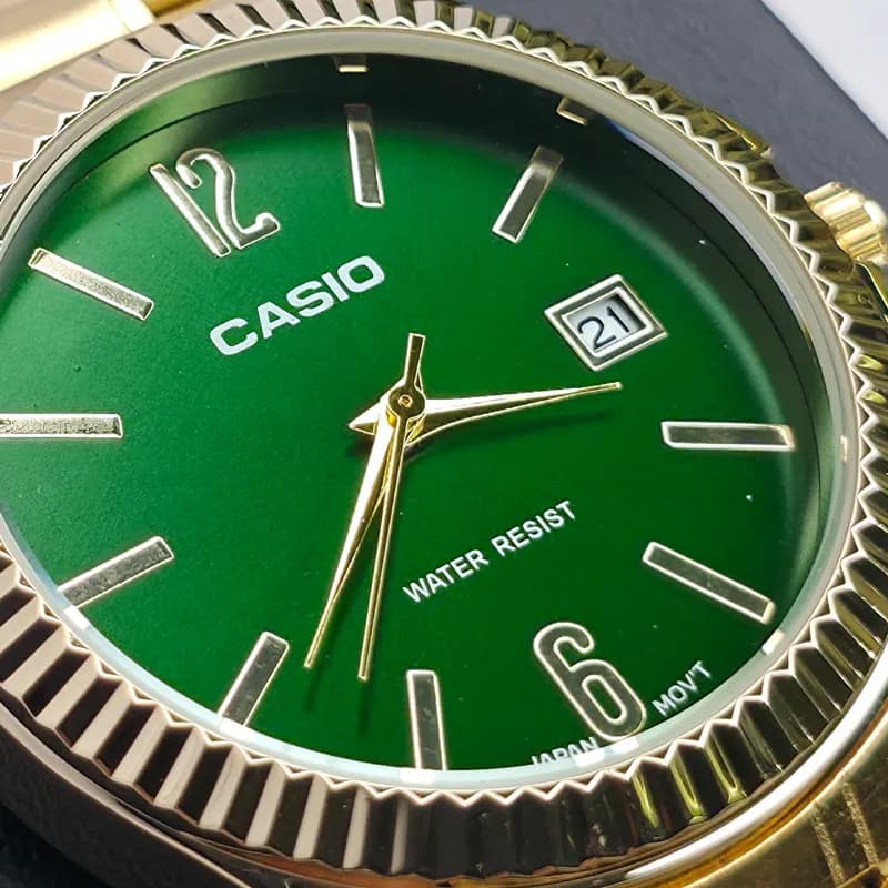 ساعت مردانه کاسیو مدل CASIO-MTP-1183 – بند طلایی صفحه سبز — تصویر ۷