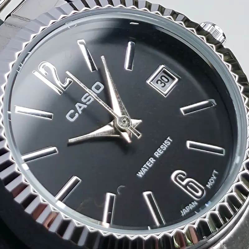 ساعت ست مردانه-زنانه کاسیو مدل CASIO-MTP-1183 – بند نقره ای صفحه مشکی — تصویر ۶