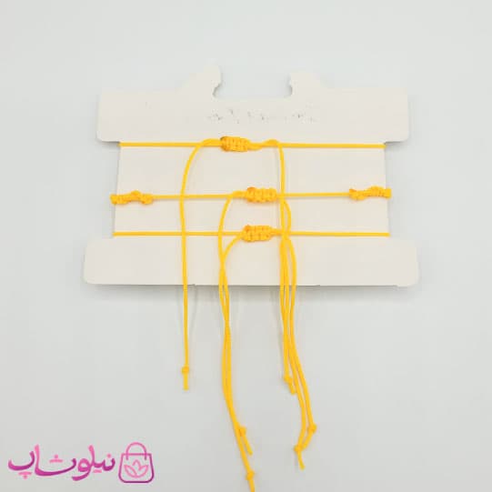 دستبند یا پابند دخترانه زرد طرح گل بابونه پک سه تایی — تصویر ۲