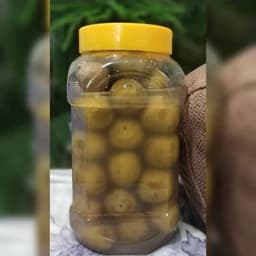 ترشی شور گوجه سبز - قیمت بر اساس وزن 1000 گرمی حدود950گرم میوه خالص ترش وترد — تصویر ۲
