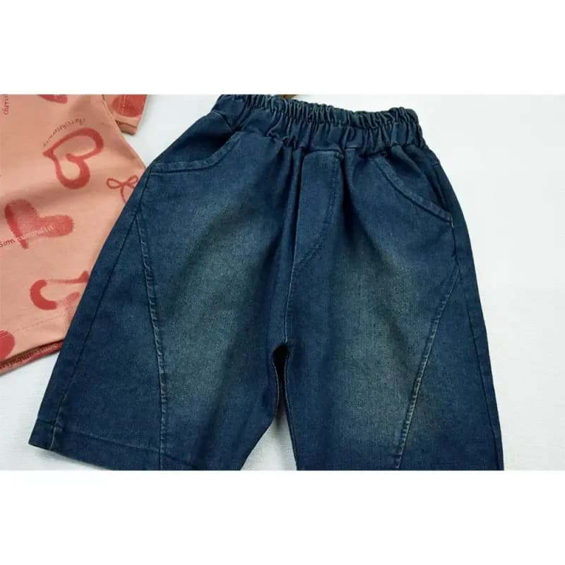 ست تیشرت و شلوارک دخترانه طرح قلبی جنس پنبه و جین کاغذی — تصویر ۹