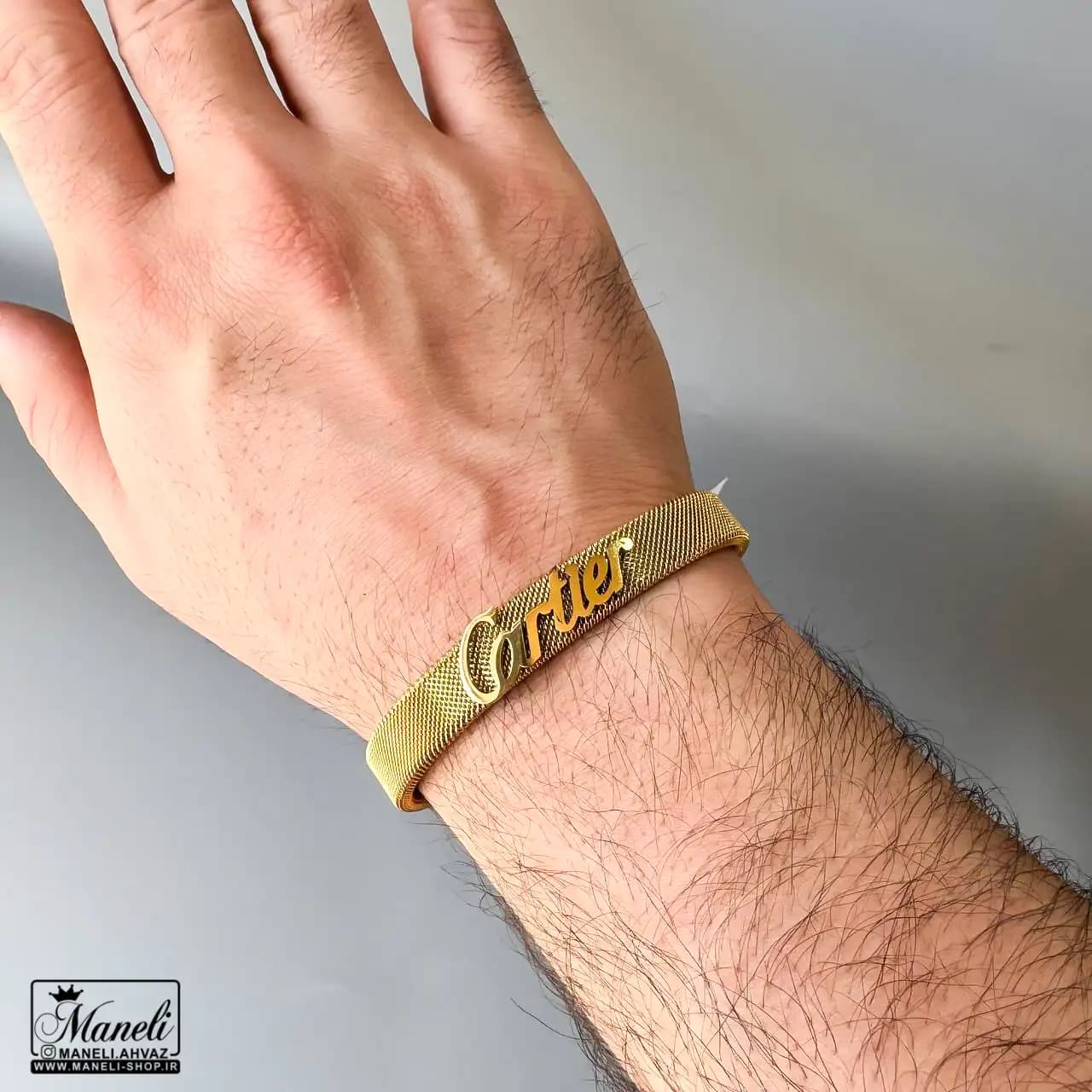بنگل حصیری مردانه رنگ طلایی با نوشته Cartier – استیل 14031243