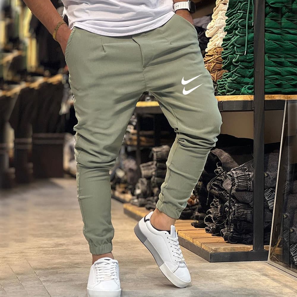 شلوار مردانه نایک NIKE اسلش بنگال کش رنگ سبز سدری دو نایک