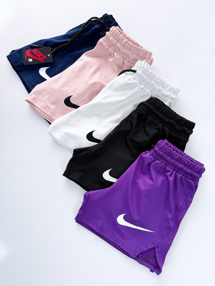 شورتک ورزشی زنانه چاک دار نایکی Nike — تصویر ۵