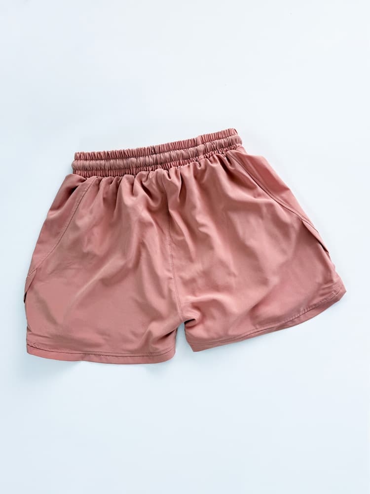 شورتک ورزشی زنانه بغل هلال جیب دار نایکی Nike — تصویر ۶