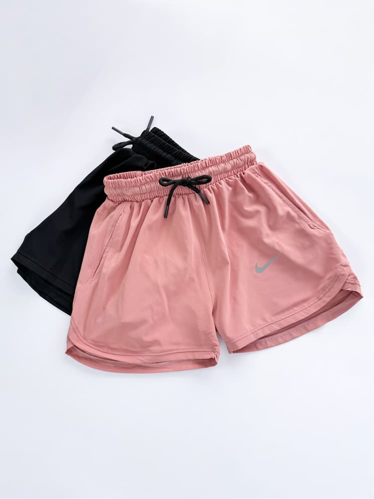 شورتک ورزشی زنانه بغل هلال جیب دار نایکی Nike — تصویر ۴