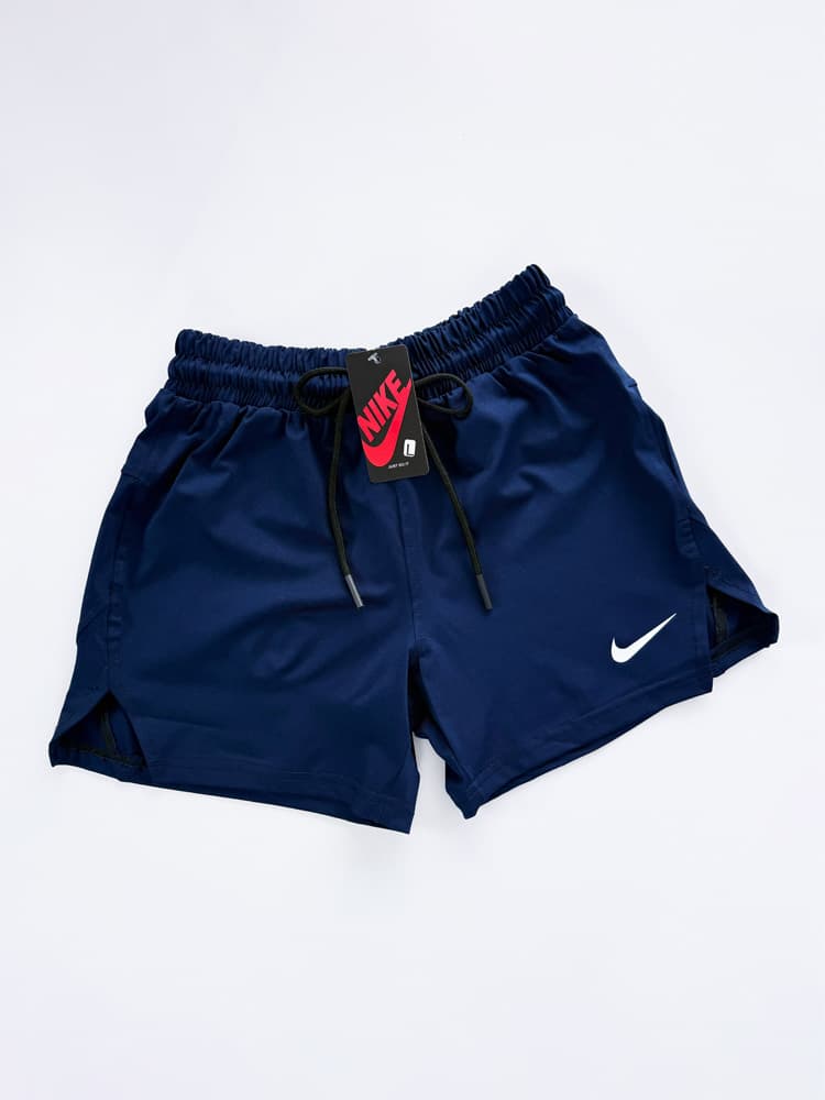 شورتک ورزشی زنانه سرمه ای چاک دار نایکی Nike