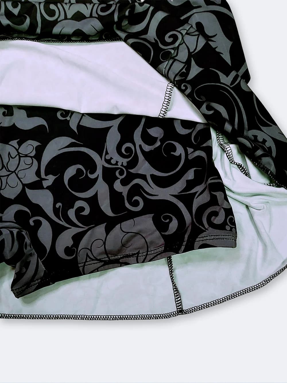 مایو زنانه دامنی کاپدار و پادار طرح مجلسی شیک اسپیدو ( Speedo ) مشکی و طوسی — تصویر ۸