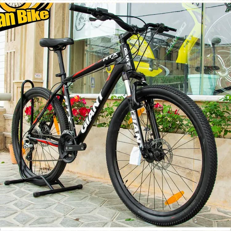 خرید دوچرخه 27.5 GIANT ATX Elite 1 کوهستان آلومینیوم جاینت ای تی ایکس الیت سایز 27.5 اینچ / ترمز روغن هیدرولیک / 24 (3×8) سرعته SHIMANO ACERA M360 / اصل با گارانتی ©️ کمترین قیمت عمده بازار / دوچ — تصویر ۲