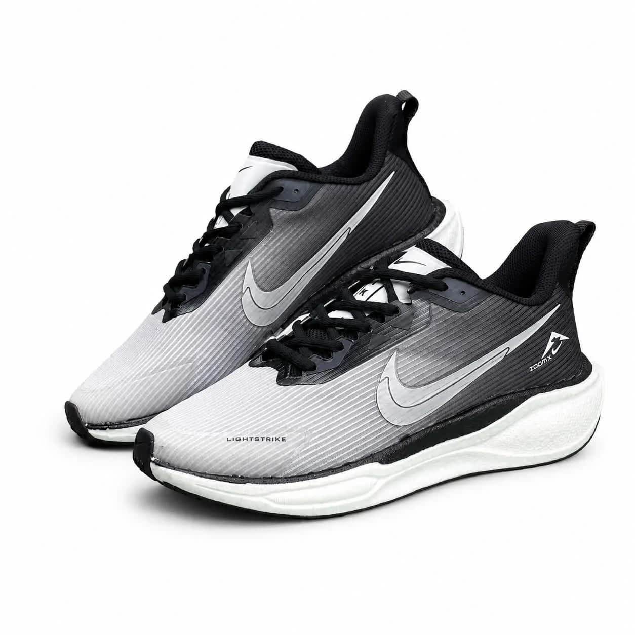 کتونی زیره بست مردانه مدل رانینگ نایکی طوسی و سفید NIKE — تصویر ۲