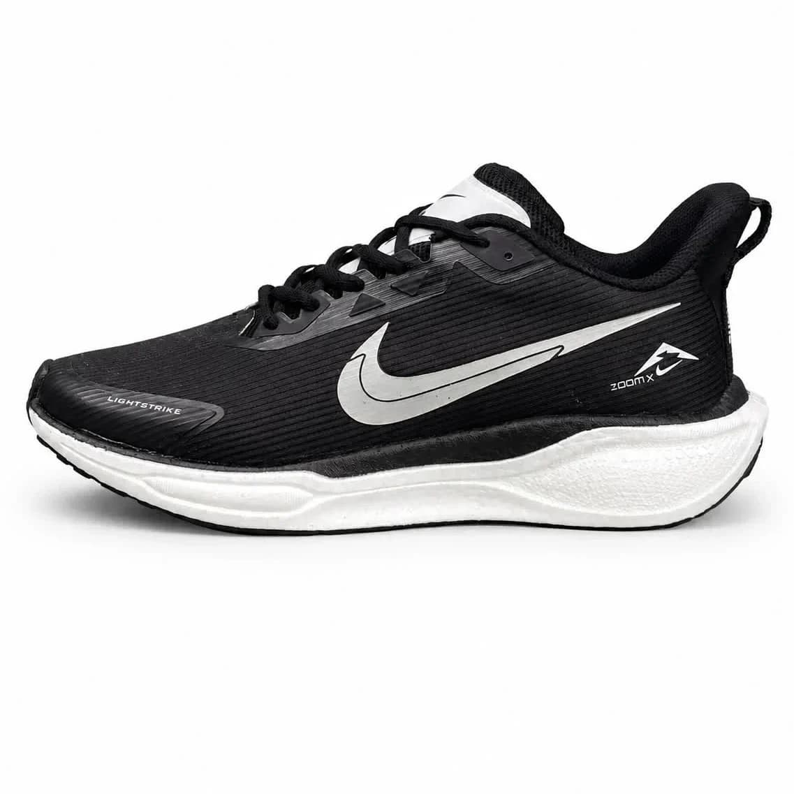 کتونی زیره بست مردانه مدل رانینگ نایکی مشکی NIKE