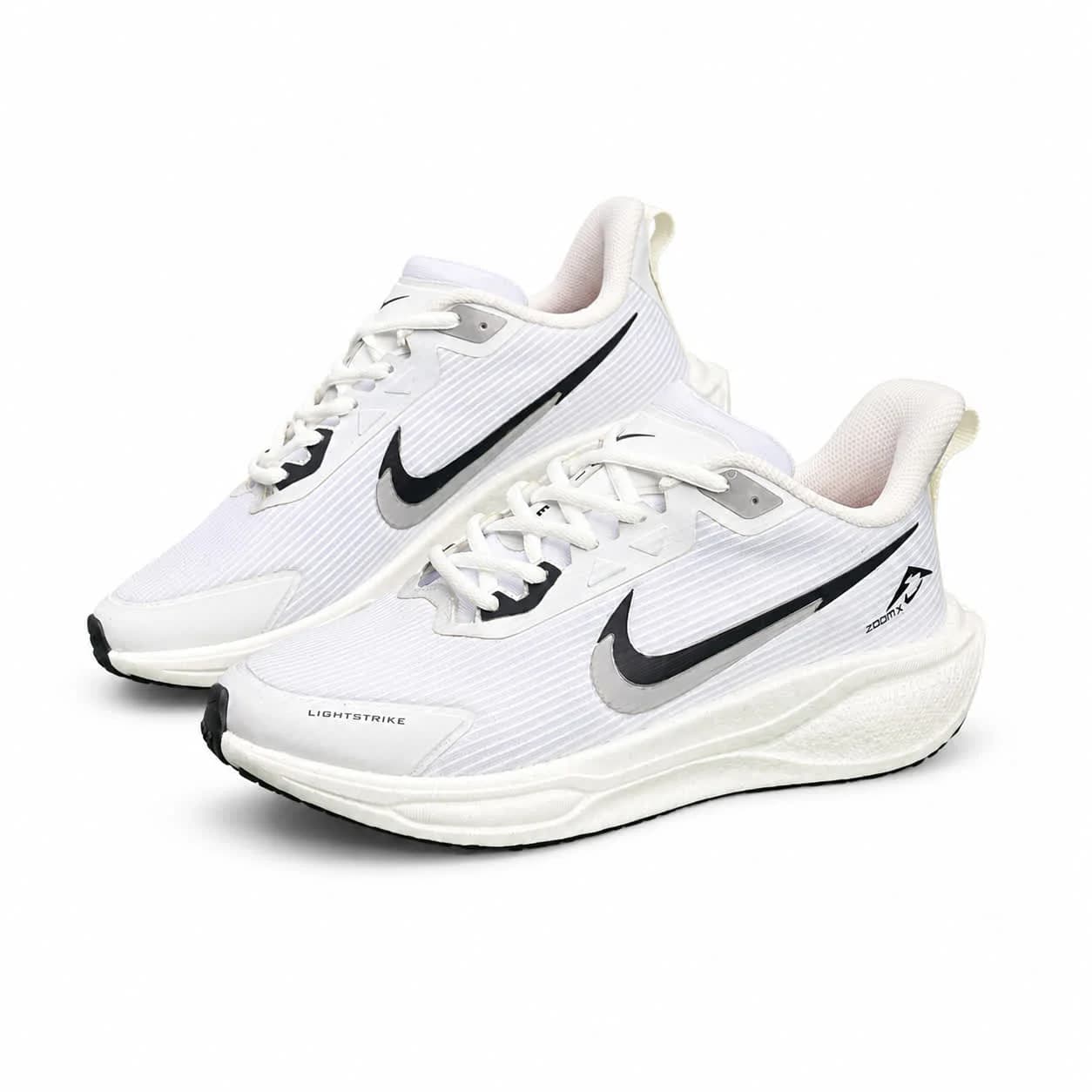کتونی زیره بست مردانه مدل رانینگ نایکی سفید نایک مشکی NIKE — تصویر ۲