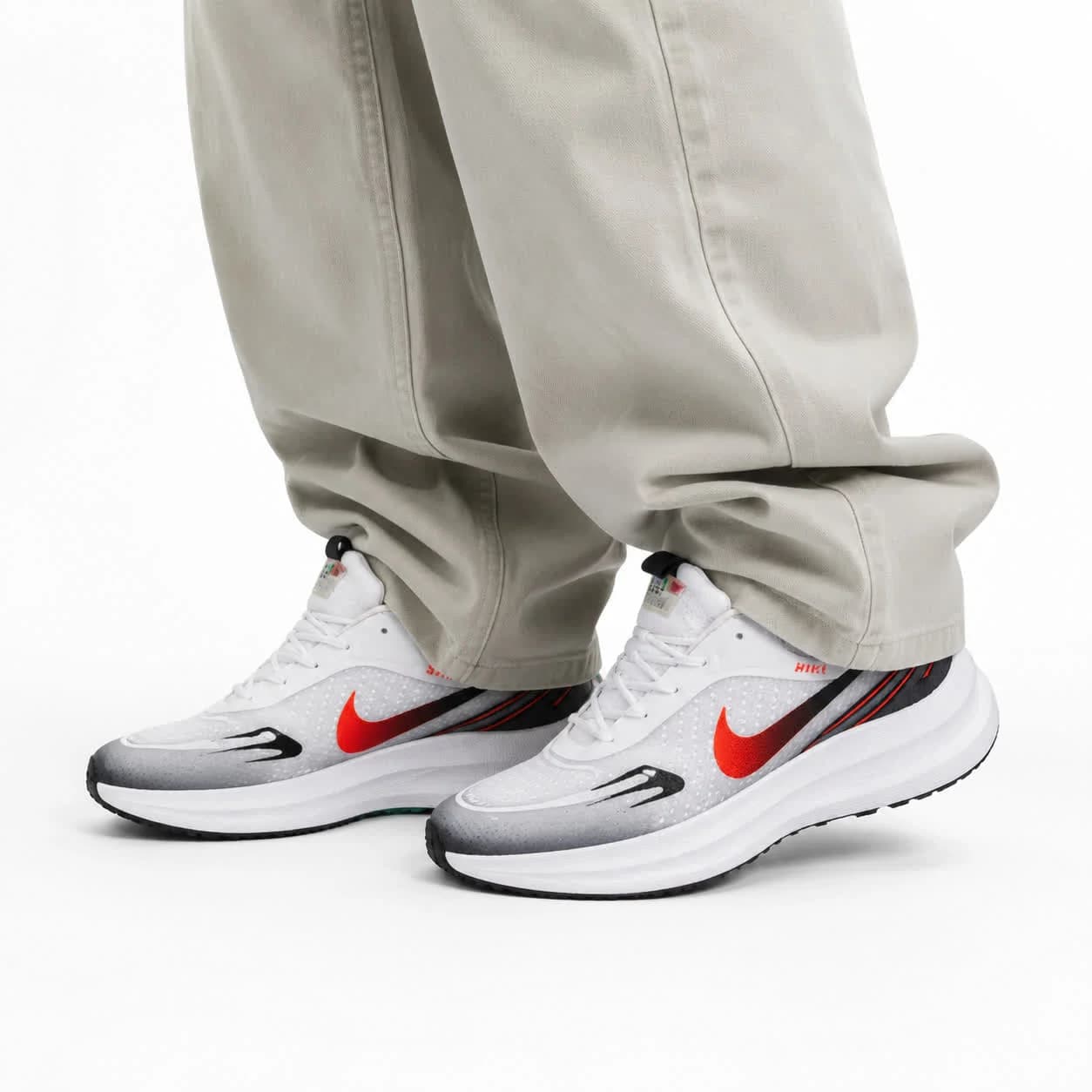 کتونی زیره بست مردانه مدل رانینگ نایکی سفید مشکی نارنجی — تصویر ۲