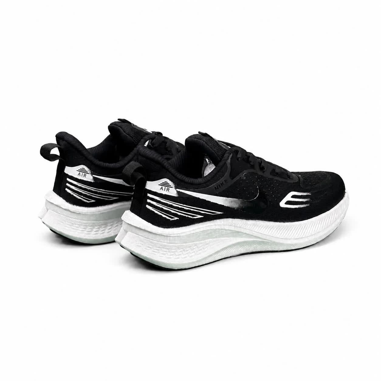 کتونی زیره بست مردانه مدل رانینگ نایکی مشکی سفید Nike — تصویر ۵
