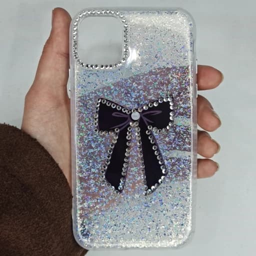 گارد Iphone 11 طرح شفاف نگین دار و شاین دار پاپیون رنگ مشکی دور نگین آیفون 11 نرمال قاب و کاور