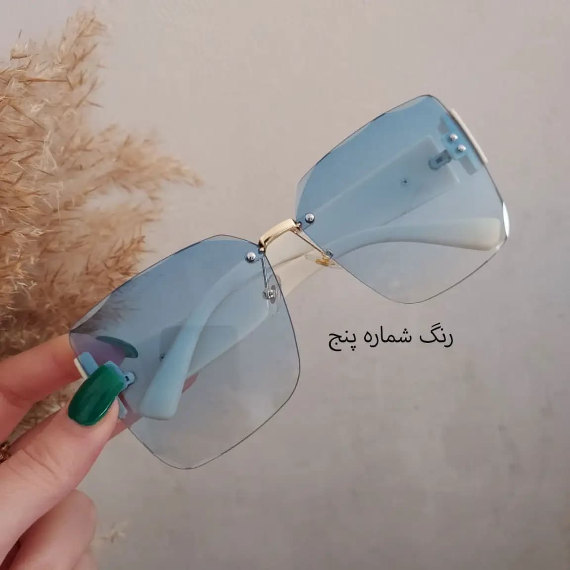 عینک آفتابی زنانه طرح جدید UV400 | مدل بدون فریم لاکچری با کیف و دستمال — تصویر ۶