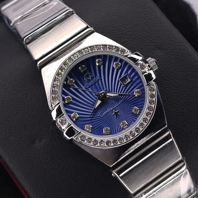 ساعت مچی زنانه امگا کانسلیشن مدل ایندکس خطی نگین دار نقره ای سرمه ای (Omega Constellation) — تصویر ۷