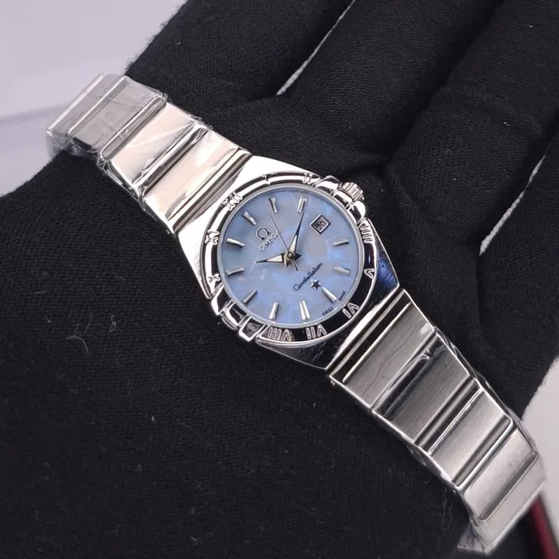 ساعت مچی زنانه امگا کانسلیشن مدل ایندکس نقره ای تیفانی (Omega Constellation) — تصویر ۶