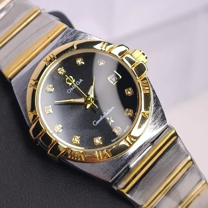 ساعت مچی زنانه امگا کانسلیشن مدل ایندکس نقره ای مشکی (Omega Constellation) — تصویر ۵