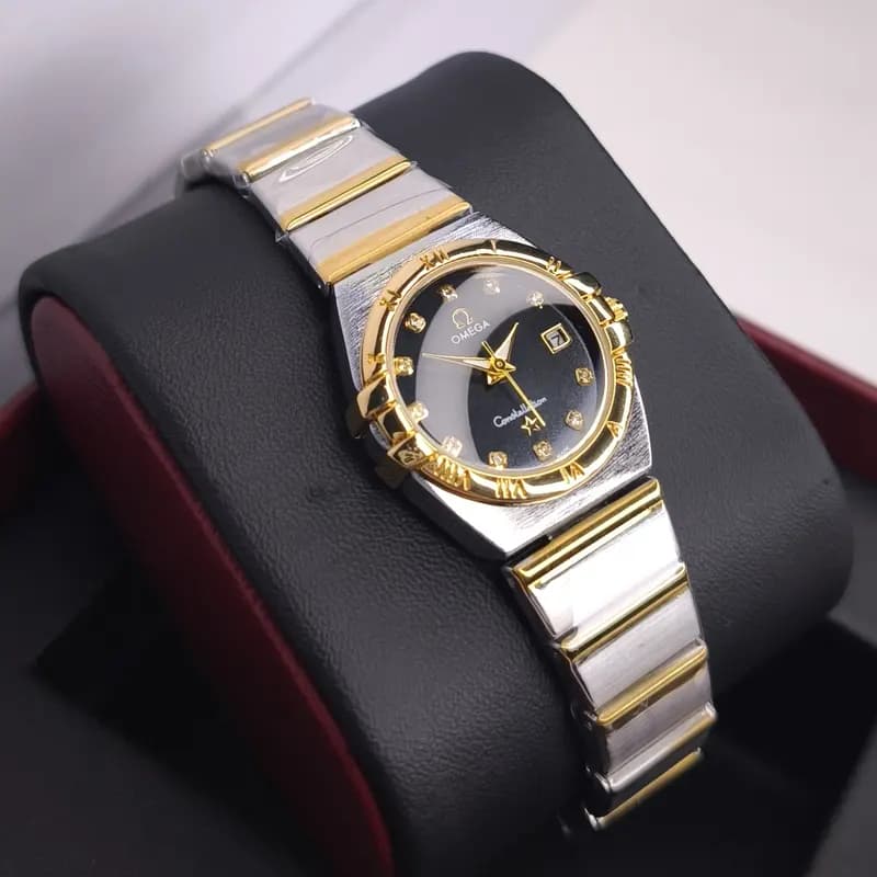 ساعت مچی زنانه امگا کانسلیشن مدل ایندکس نقره ای مشکی (Omega Constellation) — تصویر ۲