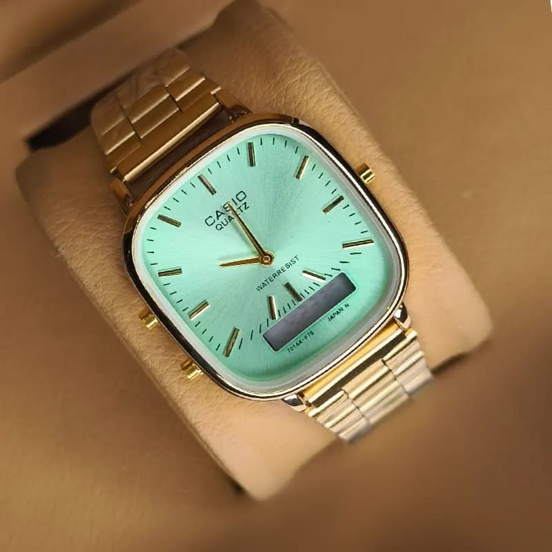 ساعت مچی مردانه کاسیو دو زمانه طلایی صفحه سبز مدل 3298G — تصویر ۴