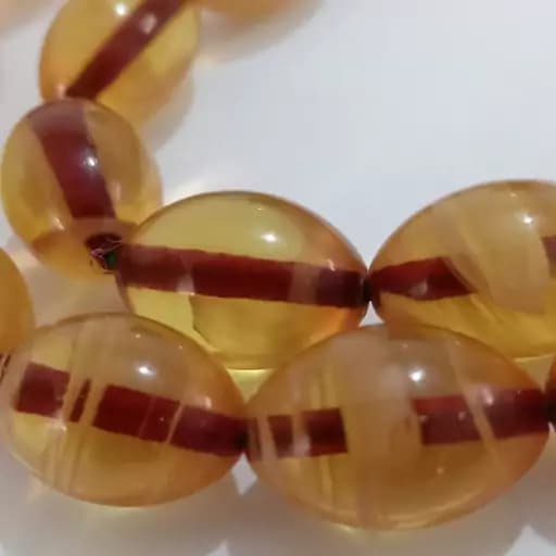 تسبیح 33دانه کهربای کره عسلی یاغ بال | تسبیح سنگی | طبیعی — تصویر ۶