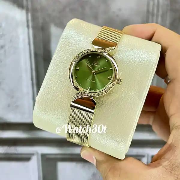 ساعت الگانس زنانه بند حصیری طلایی با صفحه سبز زیتونی