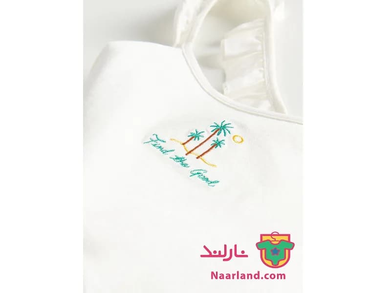 تاپ مجلسی دخترانه برند Reserved سفید طرح نخل — تصویر ۳