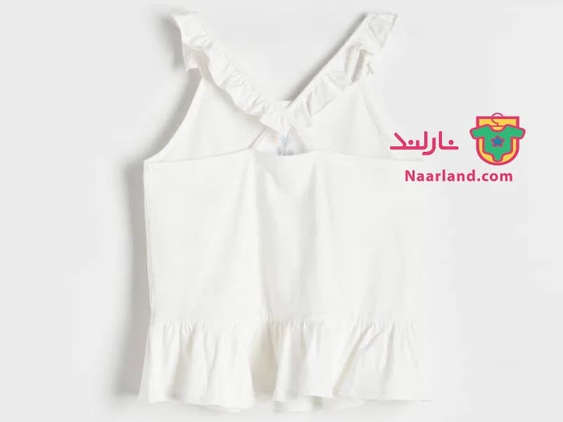 تاپ مجلسی دخترانه برند Reserved سفید طرح نخل — تصویر ۴