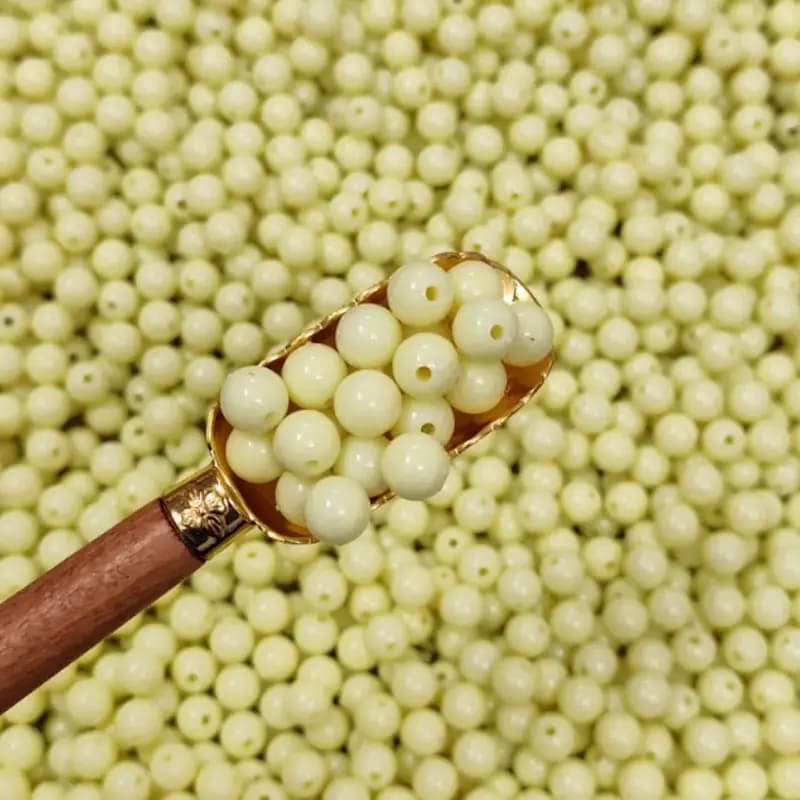مهره رنگی ایرانی لیمویی سایز10میل(100گرمی)