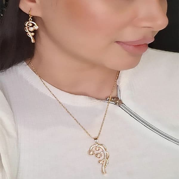 ست گوشواره و گردنبند دخترانه طرح گل رنگ طلایی