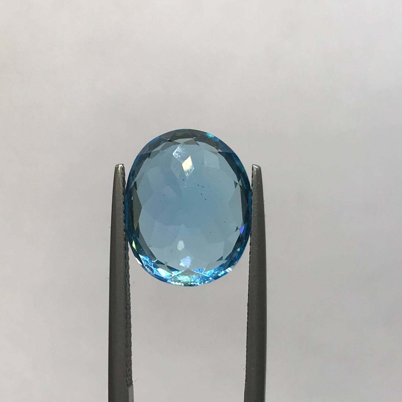 نگین توپاز آبی سوییسی اصل سایز 12*15 — تصویر ۴