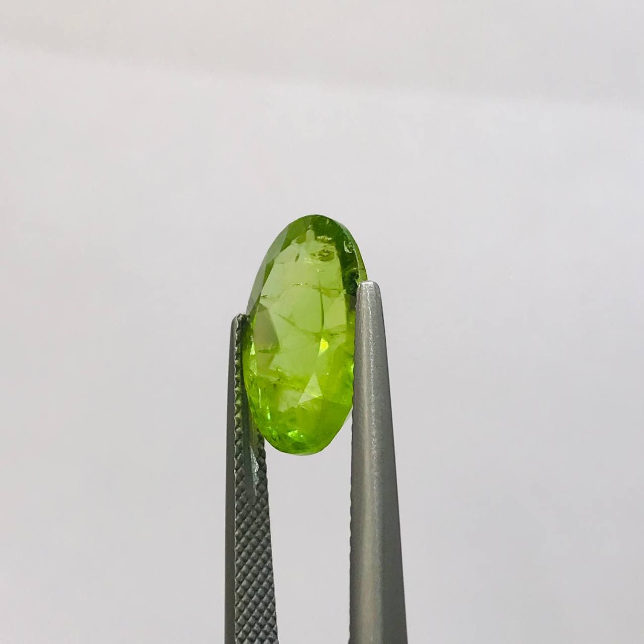 نگین زبرجد اصل سایز 15*10 — تصویر ۲